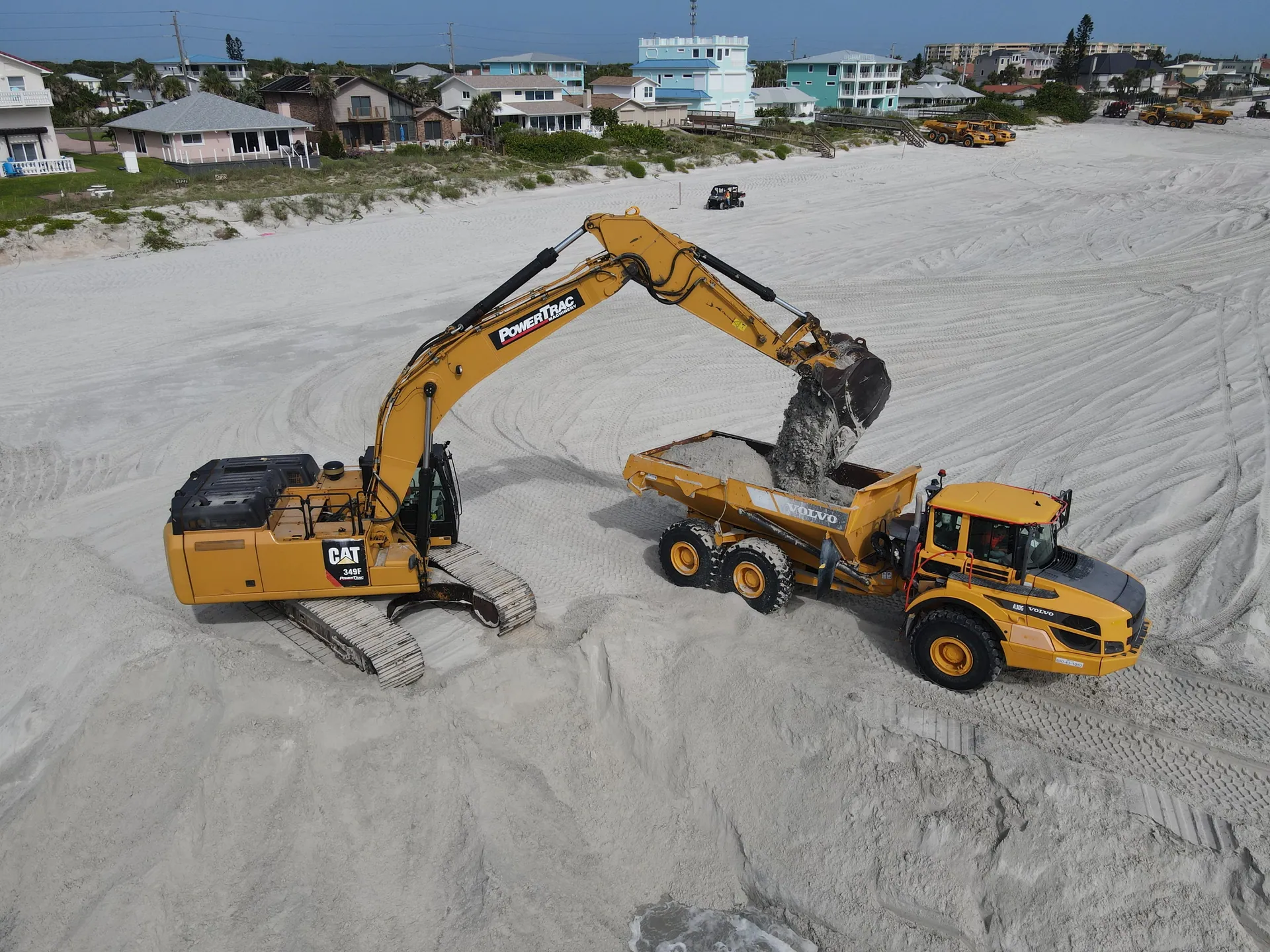 Excavator loading sand during the Ponce Inlet restoration