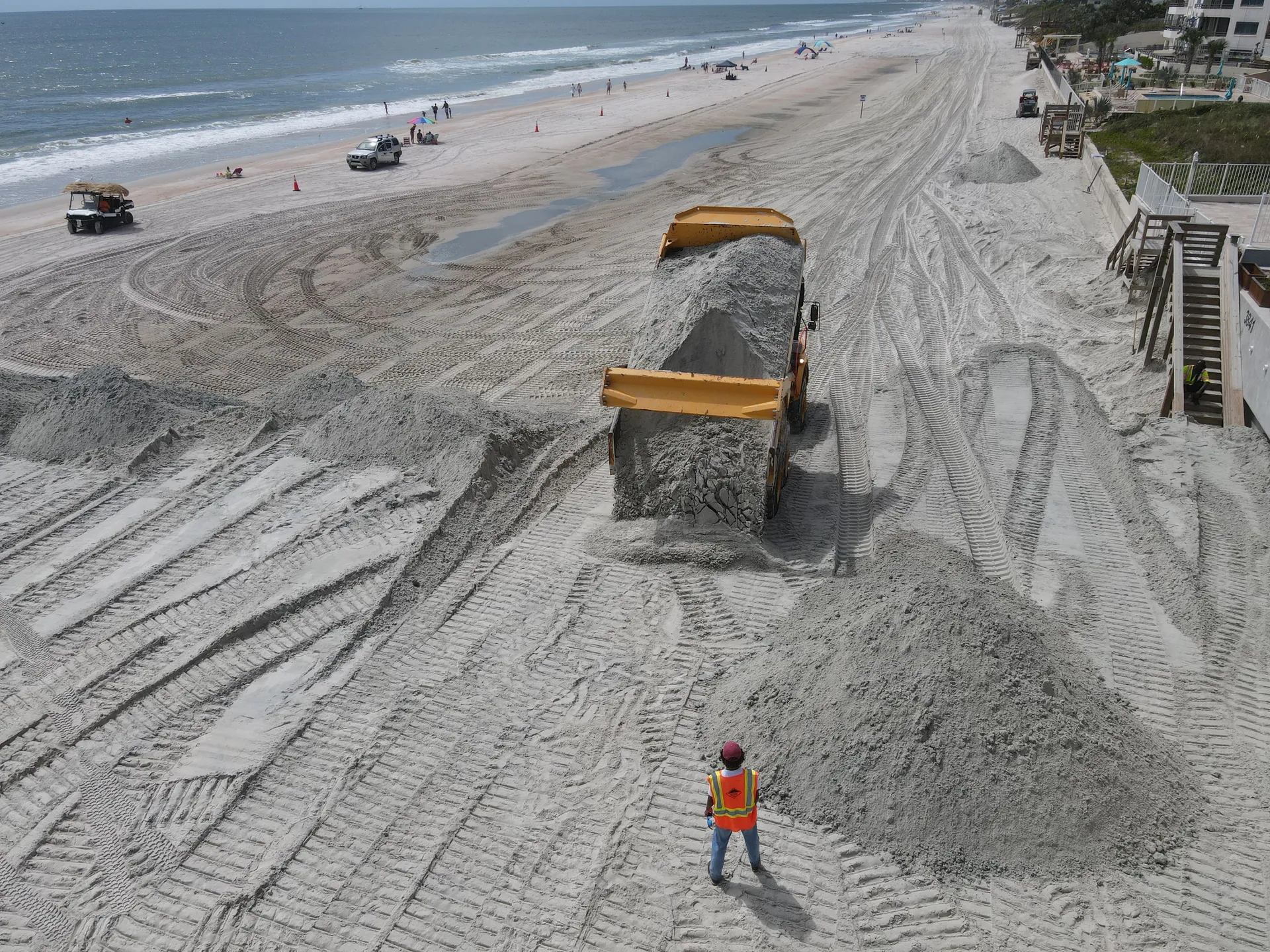 Dump truck placing sand for the Ponce Inlet dune restoration