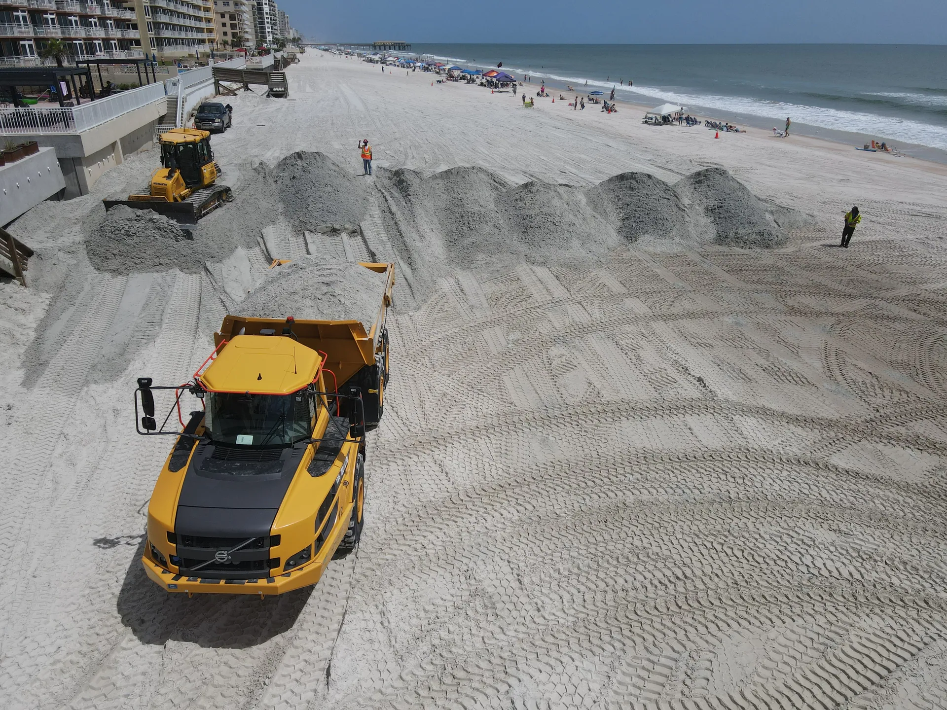 Heavy equipment shaping the restored dune